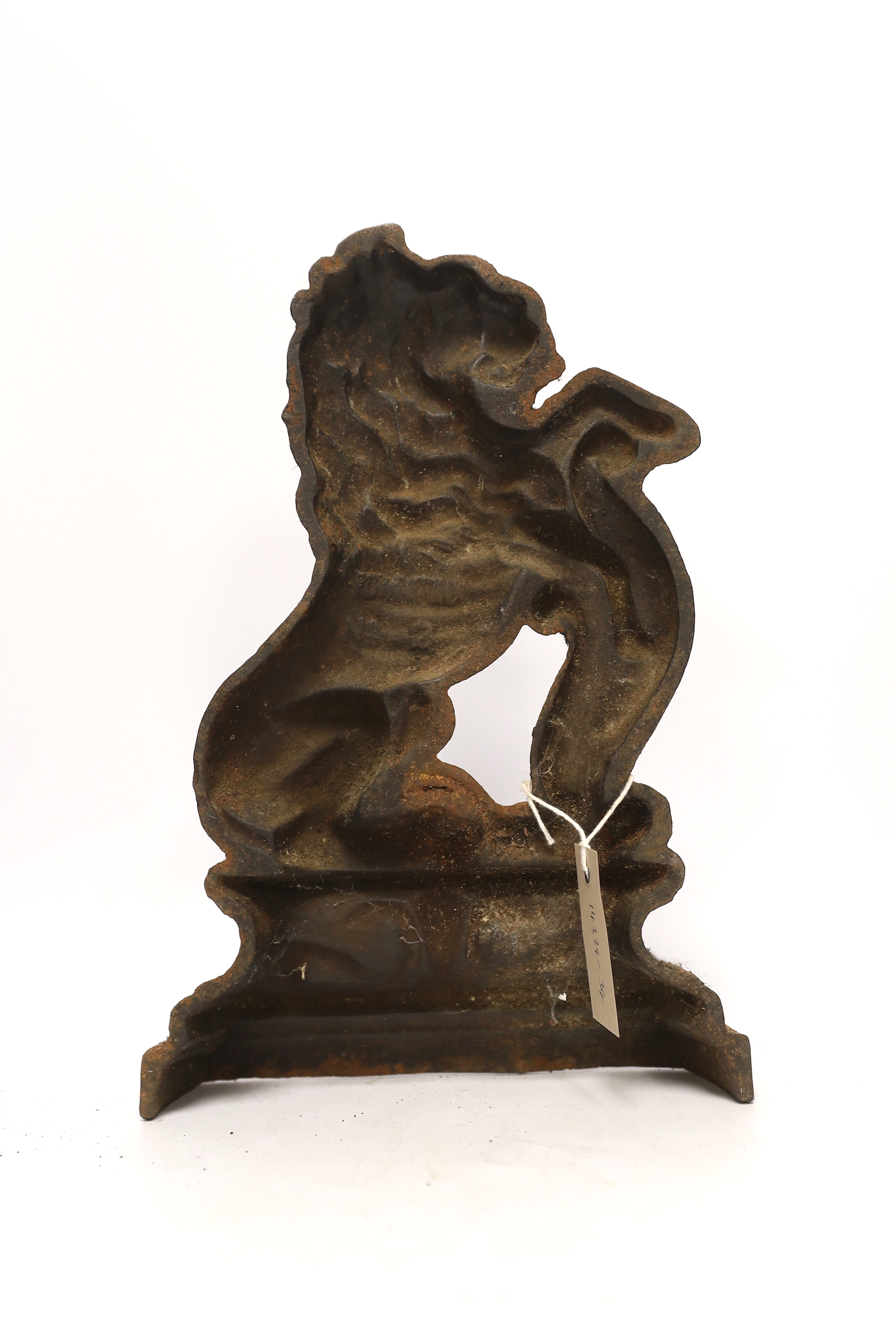 A Victorian cast iron doorstop, 25cm high